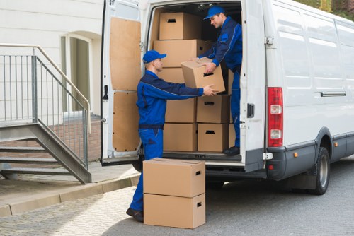 Professional house removals planning in Bromley with packed moving boxes